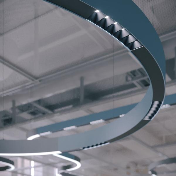 Halbkreisförmige LED-Lampe über einem großzügigen Arbeitsbereich